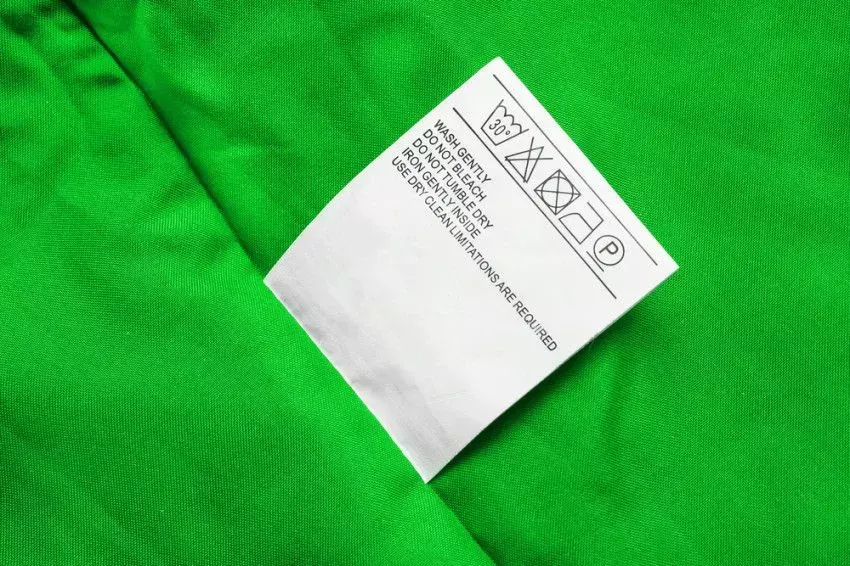 How should you wash synthetic clothing?