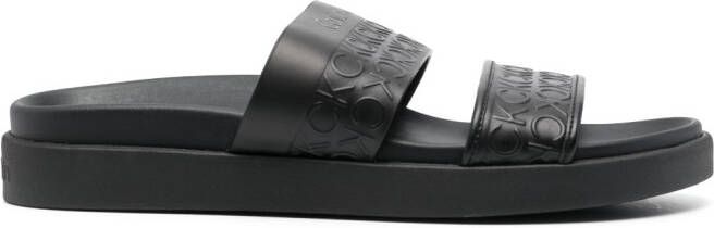 Calvin Klein embossed-logo leather slides Black
