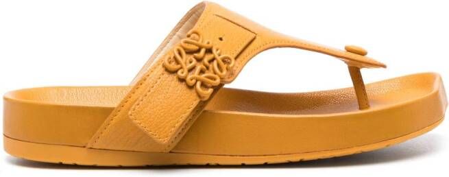 LOEWE logo-plaque leather flip flops Yellow