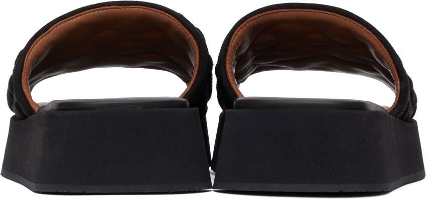 ALAÏA Black Petals Platform Mules